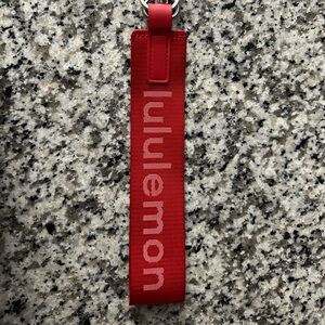 Red Lululemon Never Lost Keychain